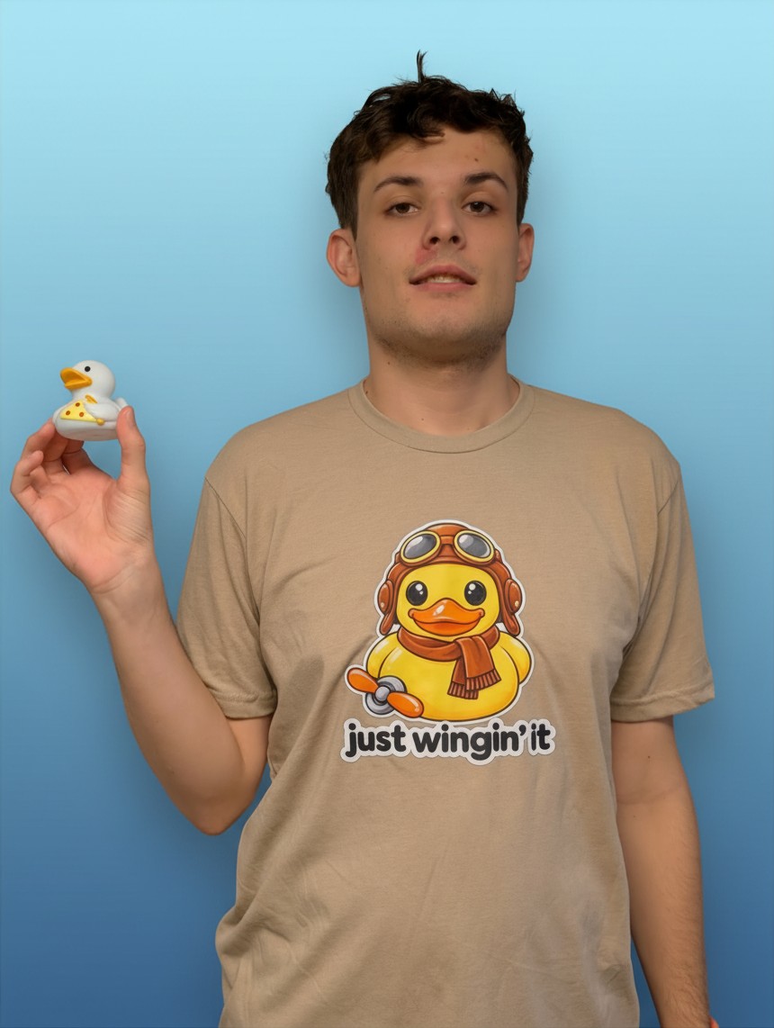 Michael holding a rubber duck from his collection