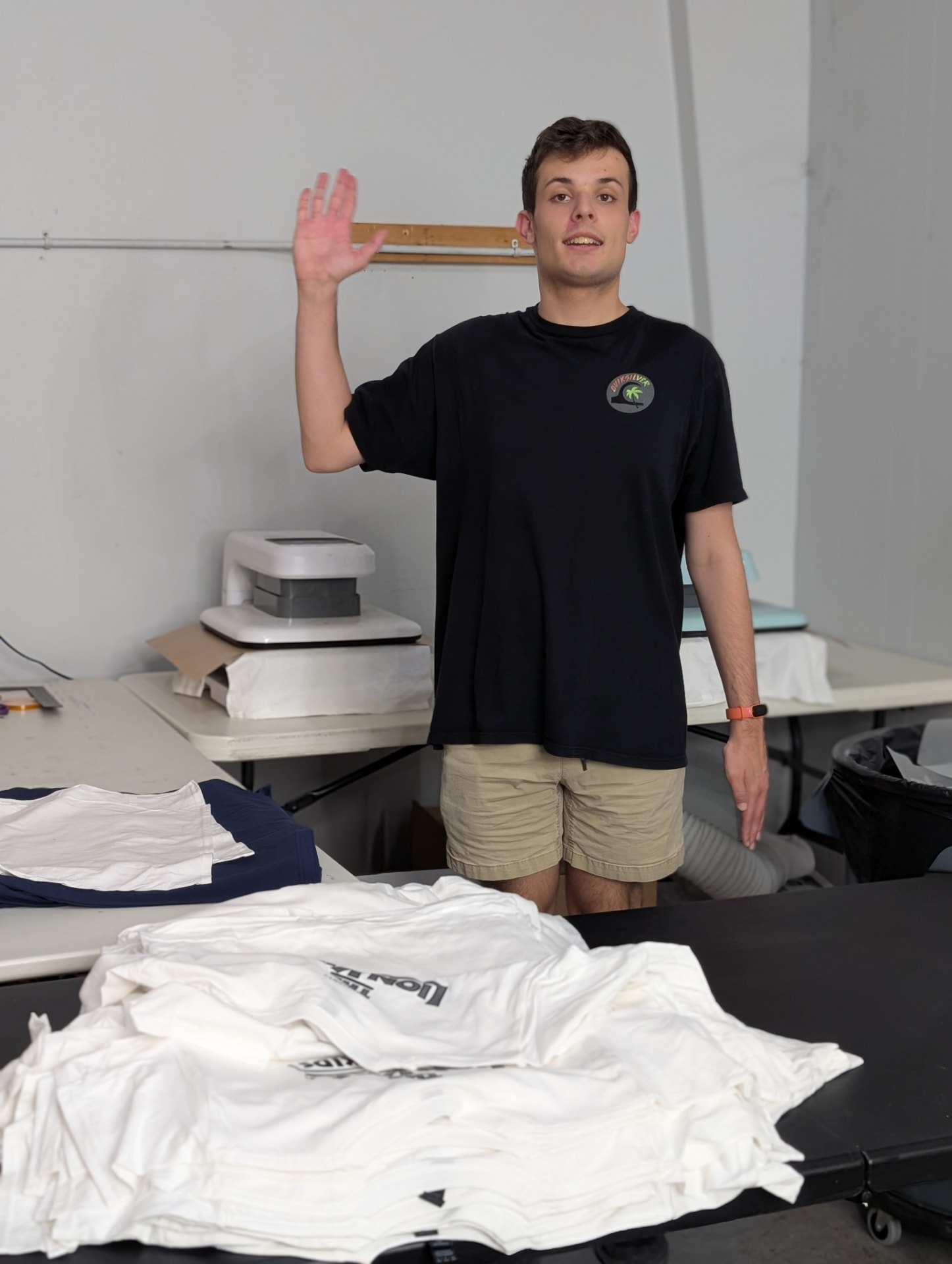 Michael at Shockwave Threads in the print shop