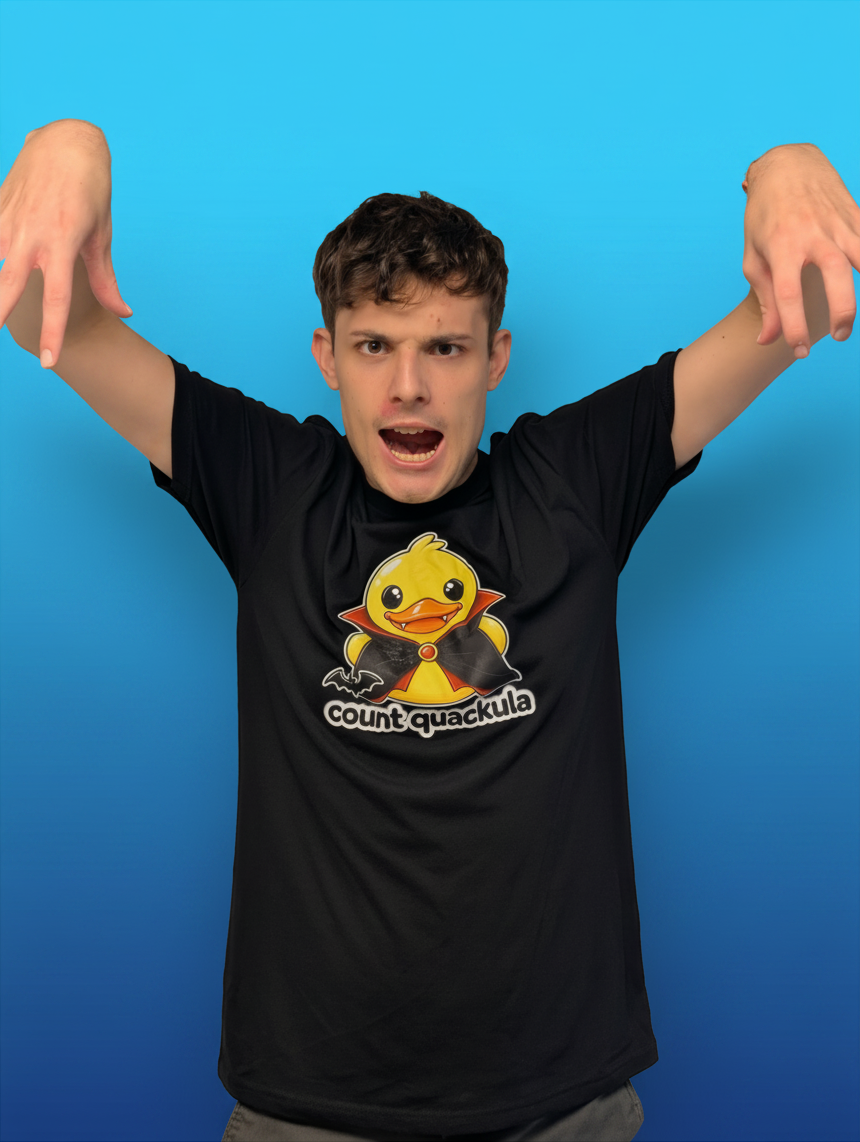 Michael pulling a playful vampire pose in the Count Quackula tee