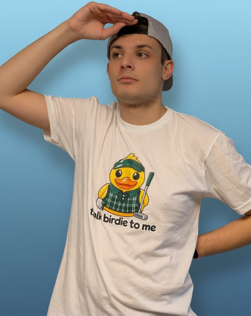 Michael wearing the white Talk Birdie To Me Beaks tee